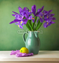 Beautiful_still_life_with_iris_flower_over_grunge_background.jpg